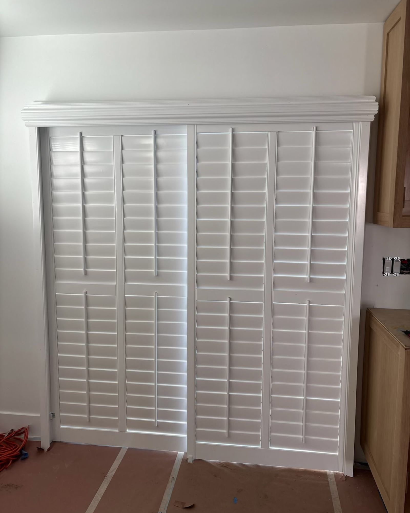 Premium custom wood shutters in an elegant living room